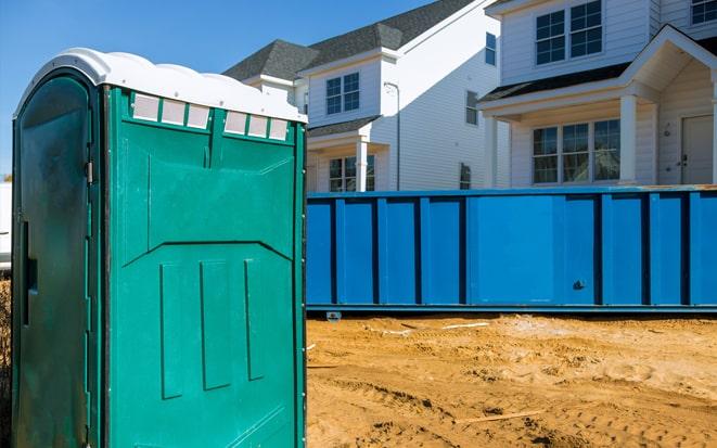 portable toilet and dumpster at a construction site in Cherry Hill NJ